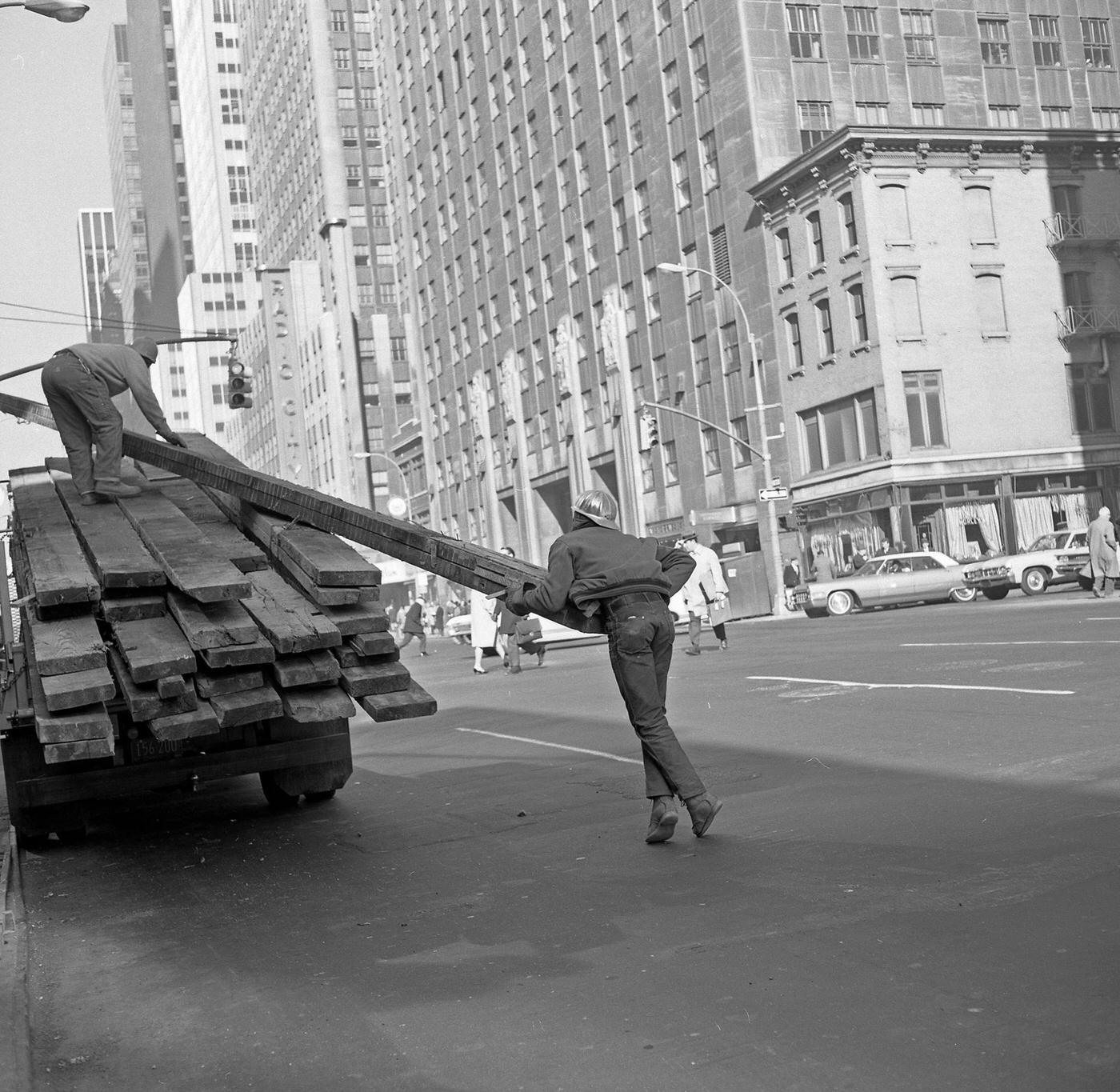 Construction Workers Loading Wood Onto A Flatbed Truck On 6Th Avenue, Manhattan, 1967