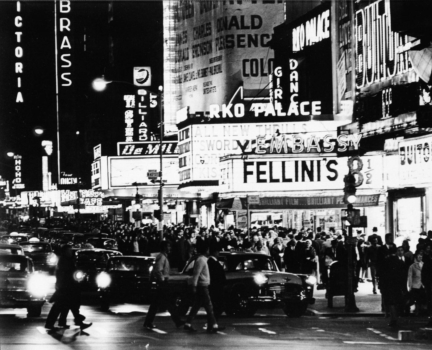 Nighttime View Of Street And Pedestrian Traffic In Times Square, Manhattan, 1963