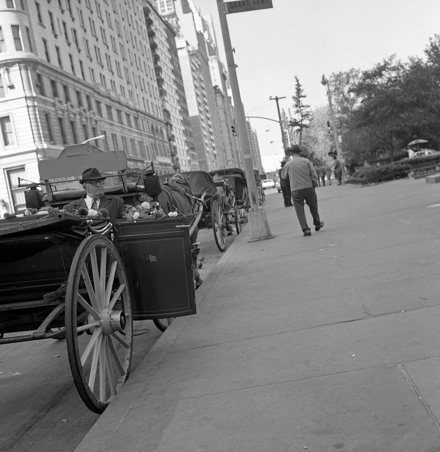 Coachman Waiting In His Horse-Drawn Carriage At Grand Army Plaza, Manhattan, 1968.