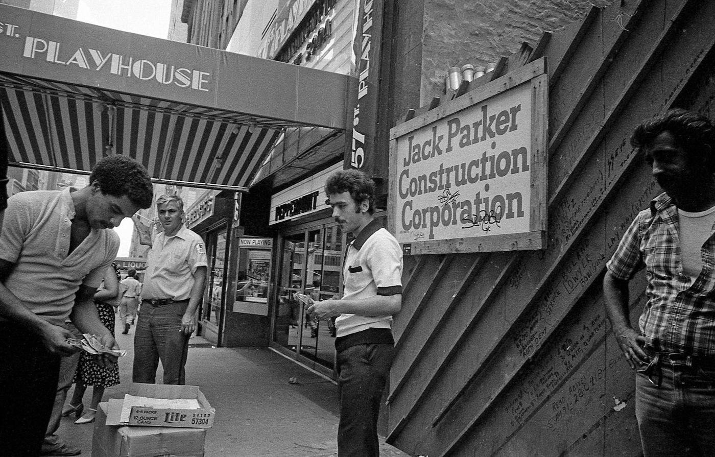 Onlookers Watch A Game Of Chance On 57Th Street, Manhattan, 1979