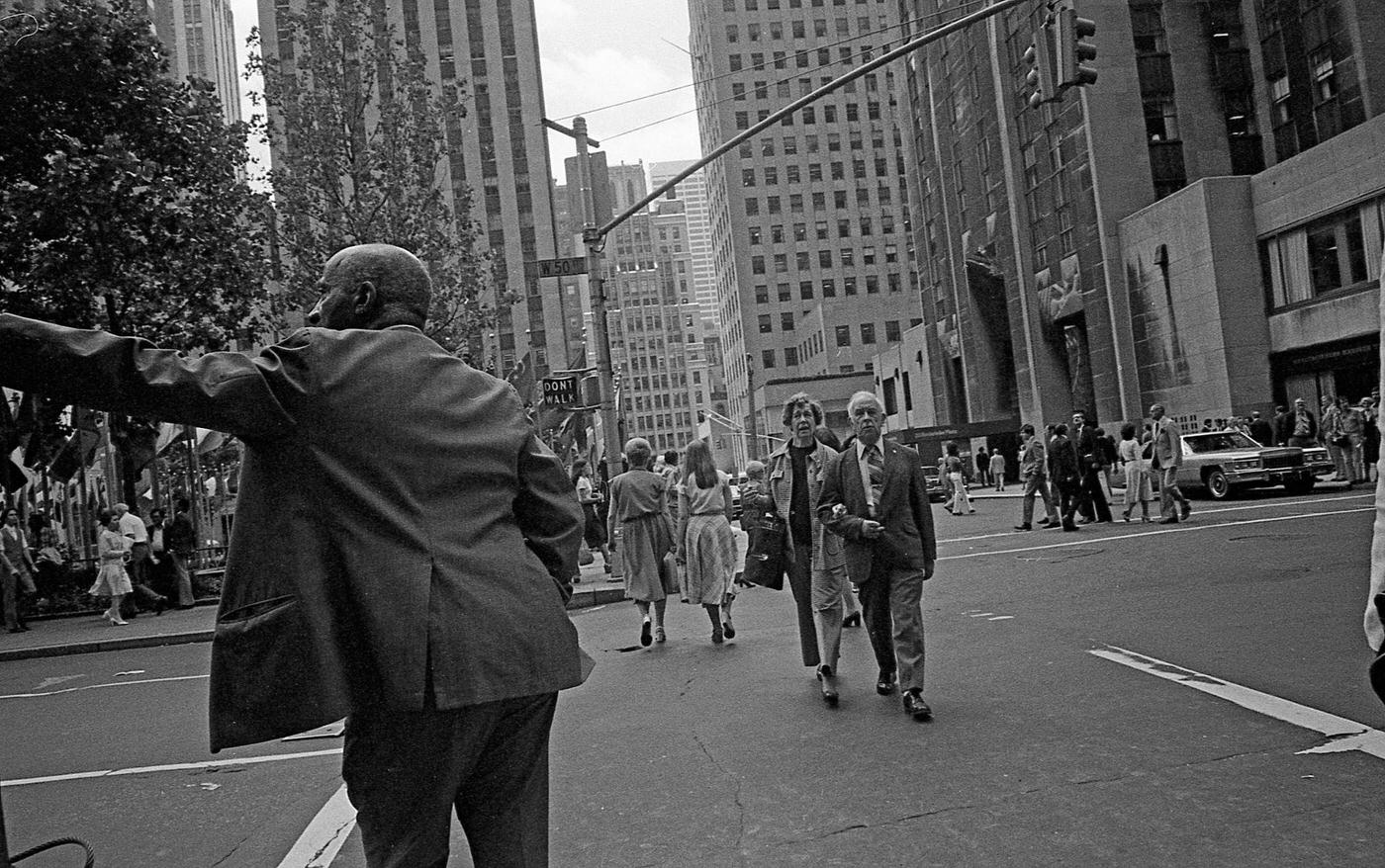 Pedestrians Crossing West 50Th Street At Rockefeller Plaza, Manhattan, 1979