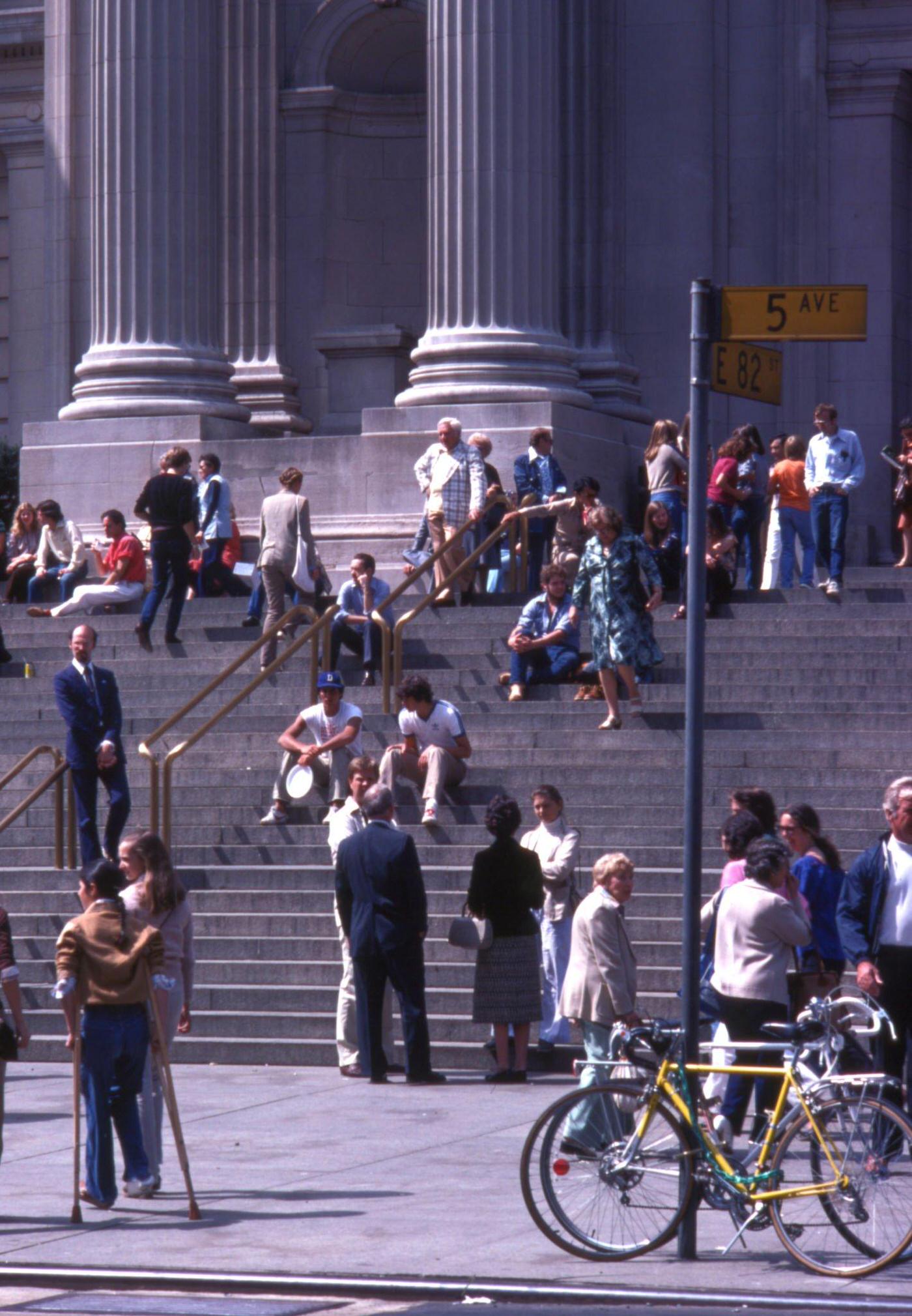 Pedestrians on the Steps Outside the Metropolitan Museum of Art in Manhattan, 1979.