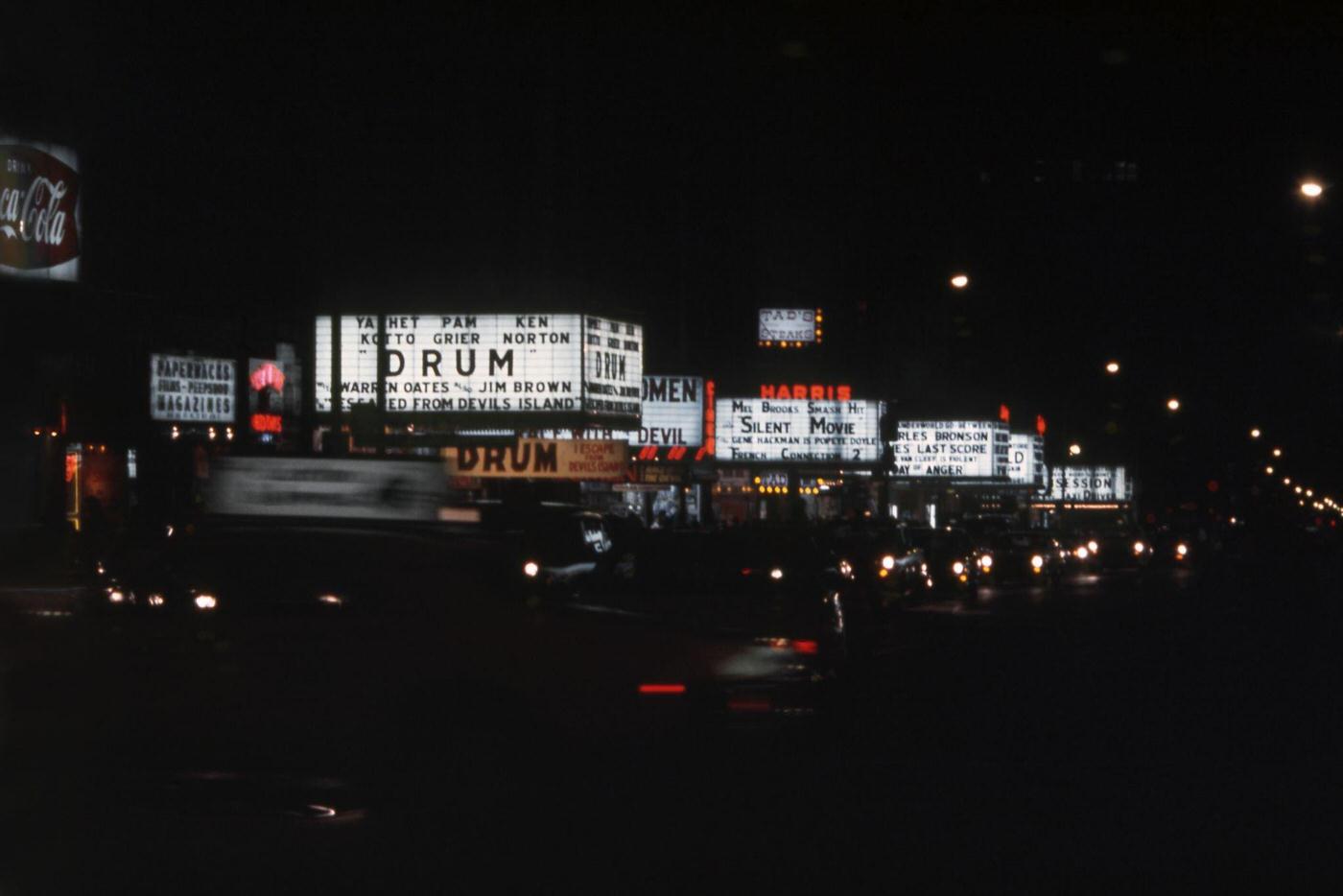 View of the Marquees of Cinemas on West 42nd Street Including the New Amsterdam Theatre, Cine 42, the Harris Theater and the Liberty Theatre in Manhattan, 1976.