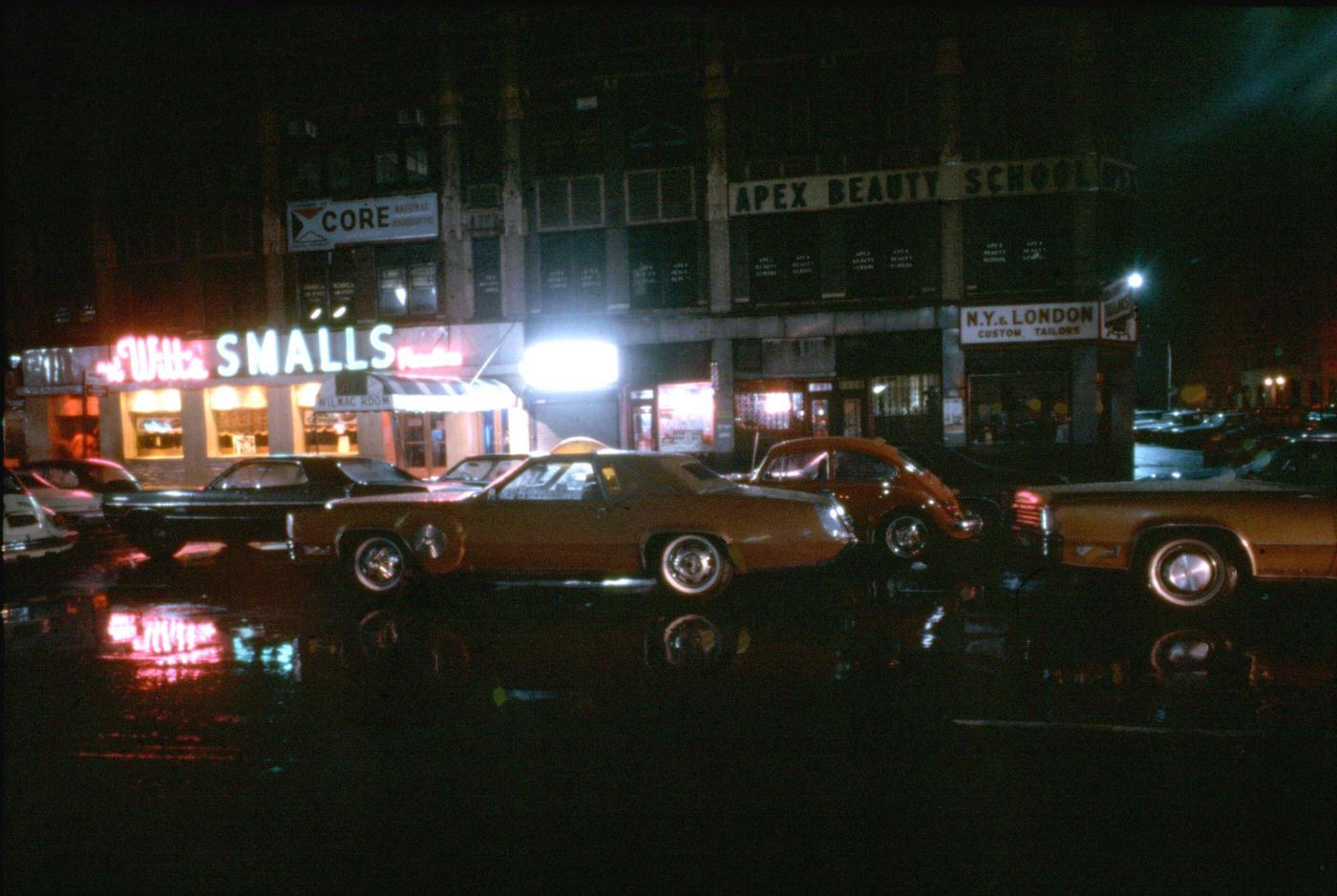 Heavily Customized Pontiac Grand Prix 'Pimpmobile' on Seventh Avenue at West 135th Street, Manhattan, 1970s.