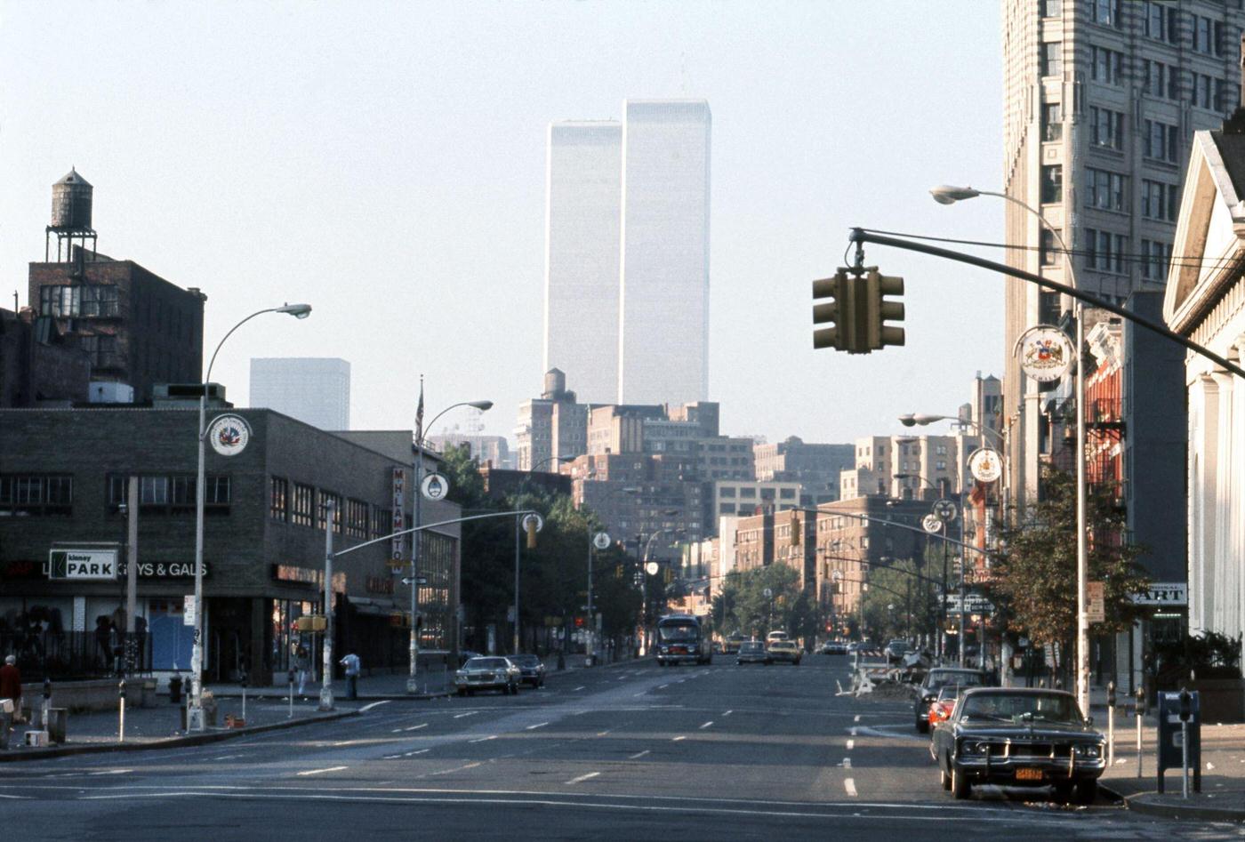 Intersection of 6th Avenue Waverly Place, Greenwich Village, Twin Towers in Background, Manhattan, 1976