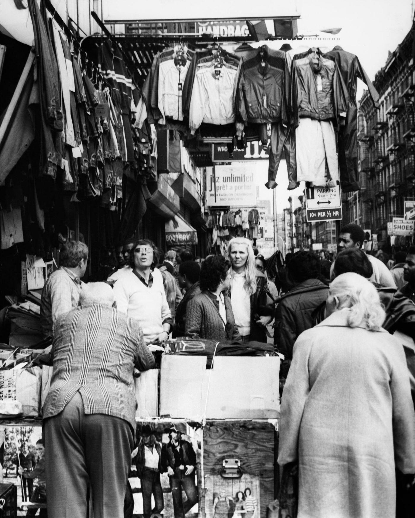 Small Crowd At Clothing Stall, Orchard Street, Lower East Side, Manhattan, 1981