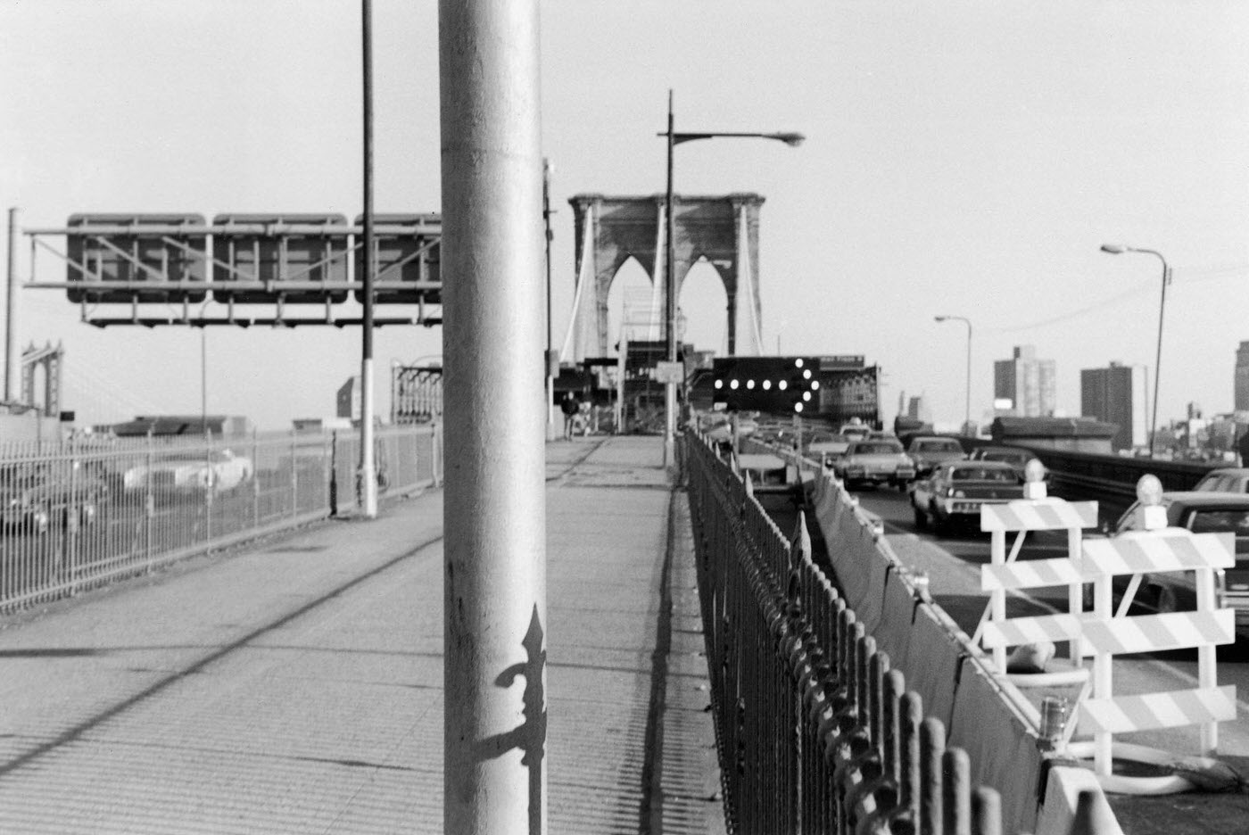 Pedestrian Entrance To Brooklyn Bridge, From Manhattan With Traffic And Roadwork Barriers, Manhattan, 1983