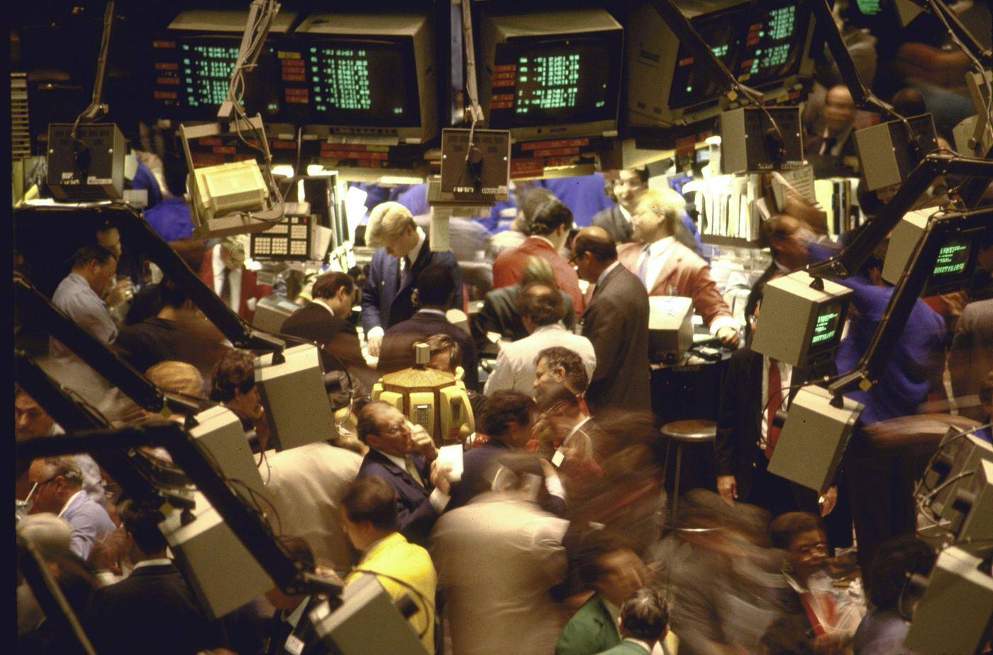 People Working On The Trading Floor Of The New York Stock Exchange, Manhattan, 1980.