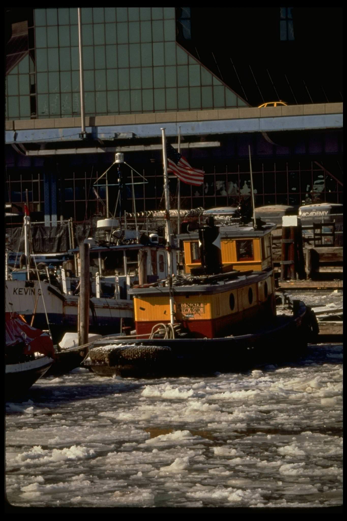 Tugboat At Dock At South Street Seaport In Frozen East River During Cold Spell, Manhattan