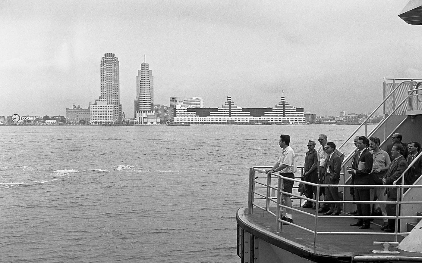 Commuters Prepare To Exit The Robert Fulton Ferry At Battery Park City With Jersey City Skyline Visible, Manhattan, 1997