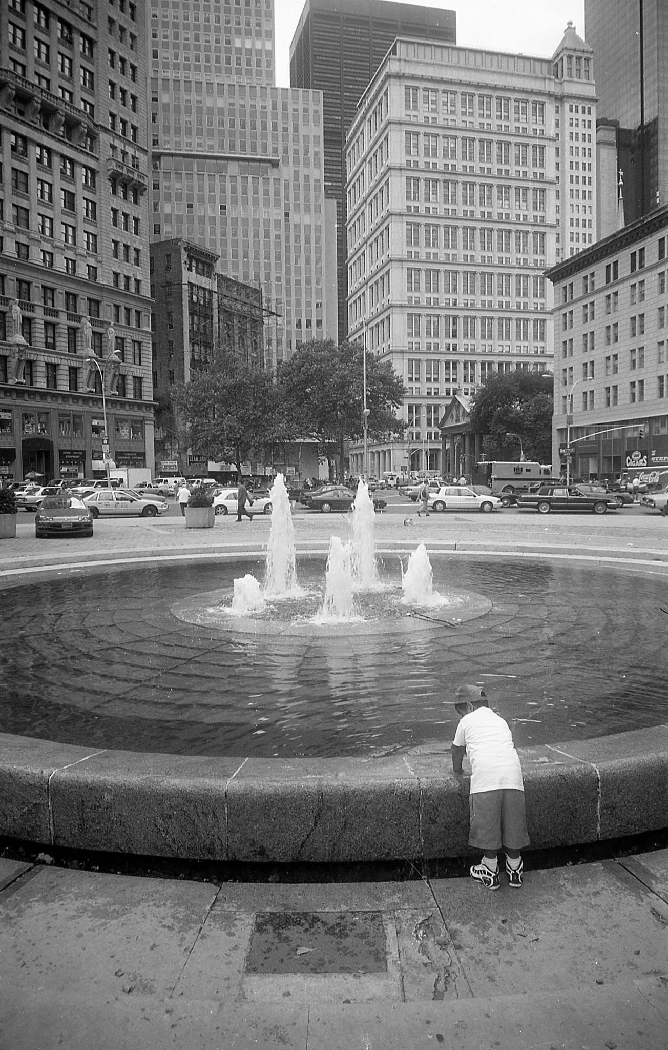 Child In Front Of The Fountain In City Hall Park, Manhattan, 1996