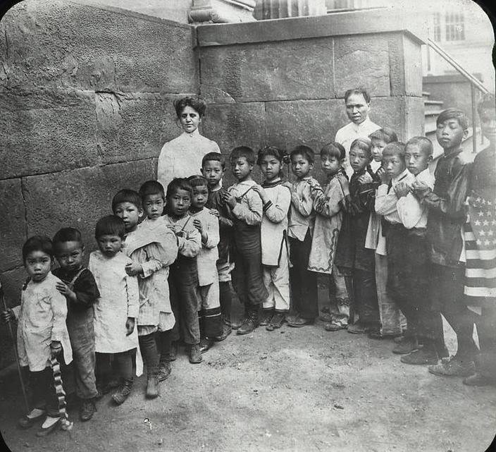 Sunday School After A Visit To Chatham Square, Showing Chinese Children Lined Up By Size.