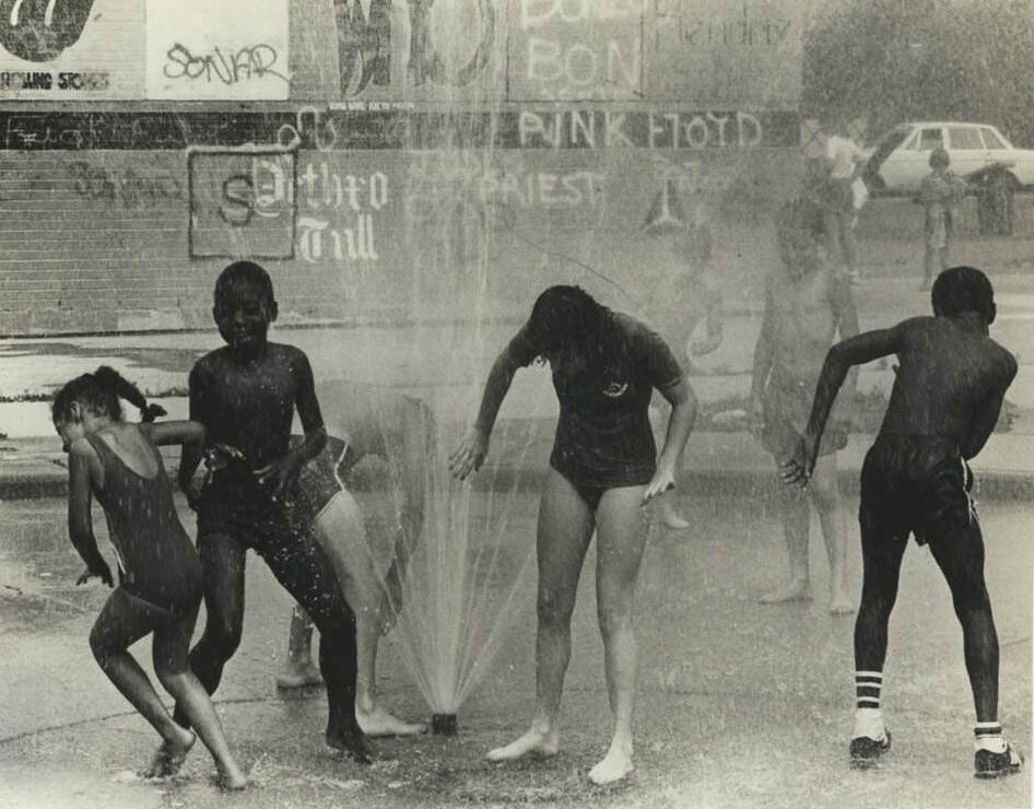 Cooling Off In The Ps 52 Playground, 1973.