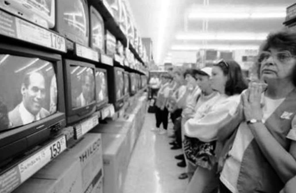 Smiling Oj Simpson Seen On Tv Screens At Electronics Department At K-Mart, New Dorp, 1995.