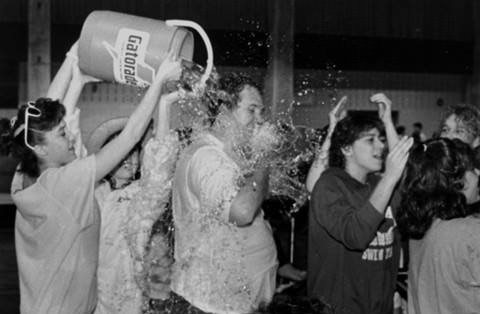 Notre Dame Coach Doc Purpura Gets Dunked By Team, 1987.