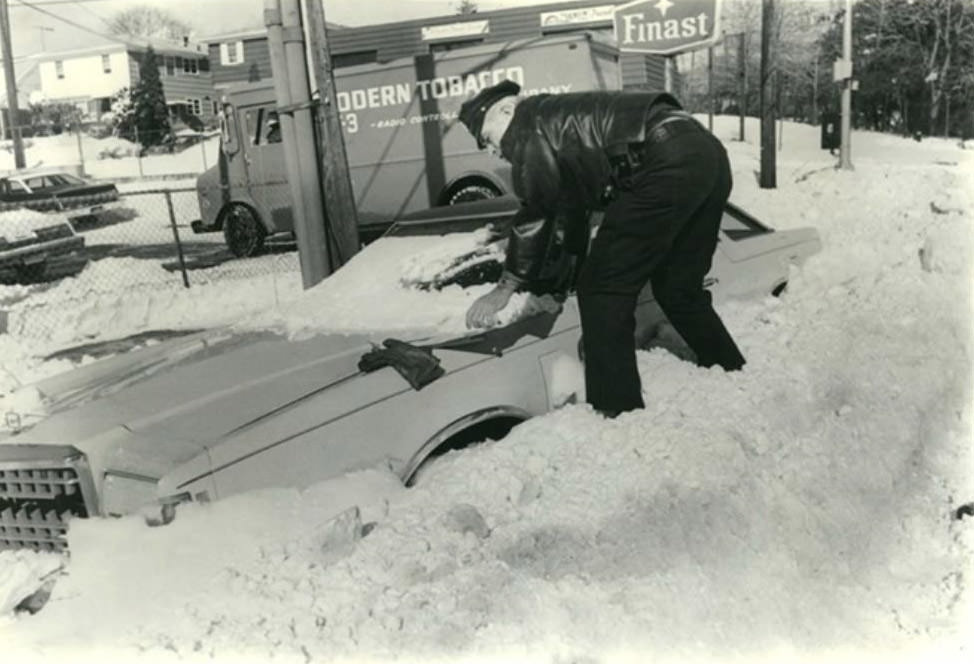 Hylan And Old Town Road, Car Buried In Snow Gets A Ticket During The Blizzard Of '78, 1978.