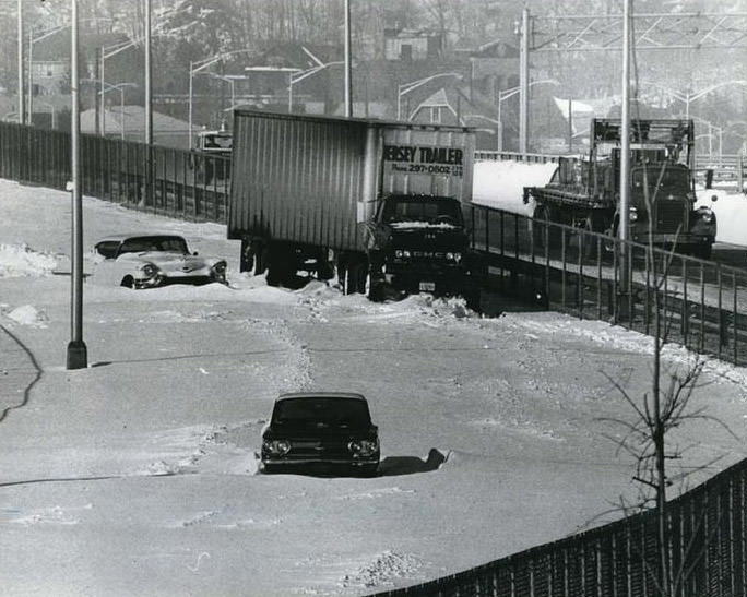 Tractor Trailer And Cars Marooned In Snow On Narrows Road South, 1967.