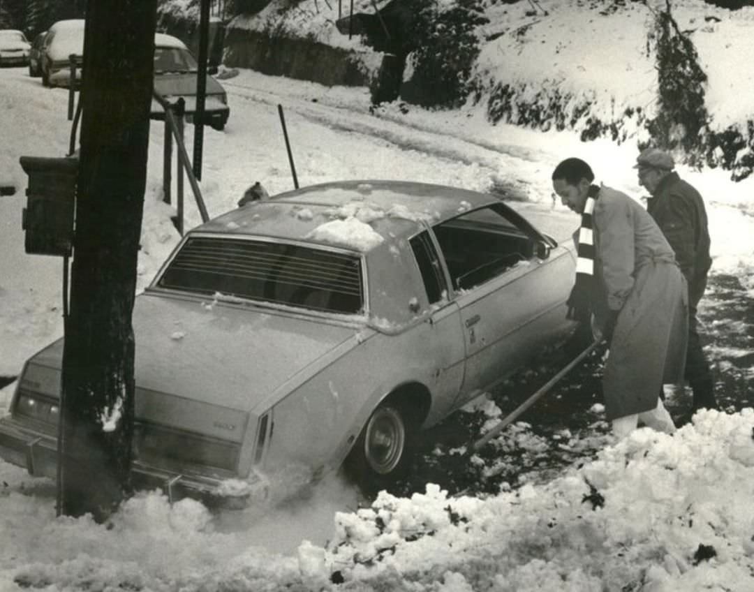Michael Fox Helps Tommy Costantino Get Traction After Car Slides Down Hill, 1990.