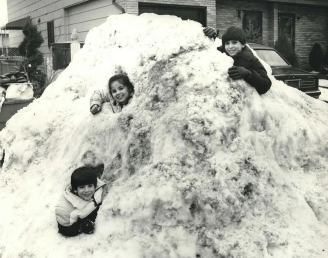 Graniteville Youngsters Burrow Into Mound Of Snow, 1985.