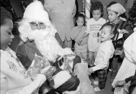 Santa Claus Gives Out Candy At The Children'S Christmas Party At The Shiloh Ame Zion Church, Henderson Ave, 1994.