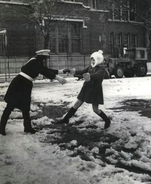 Susan Mcconnell And Crossing Guard Bridge Ice And Slush Outside School, 1970.