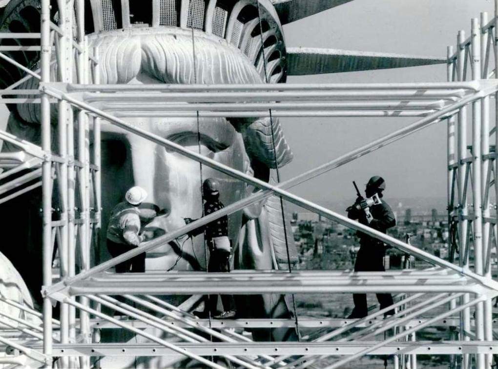 Workers Give Lady Liberty A Facelift During The Centennial Conservation-Restoration, 1984