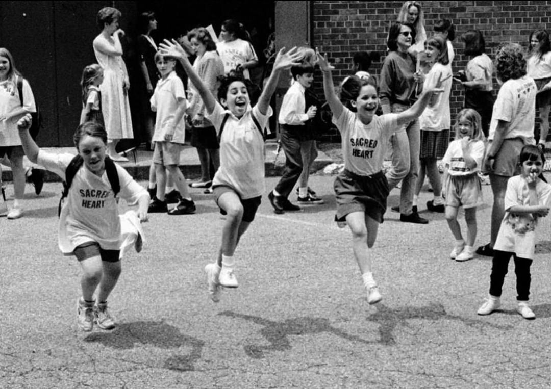 Fifth Graders, Paul Clifford, Jennifer Maceda, And Kerry Thomson Jump For Joy At Sacred Heart School, West Brighton, 1995.