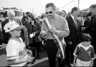 Mets Pitcher John Franco Signs An Autograph For Ashley Frange At The Columbus Day Parade, 1997.