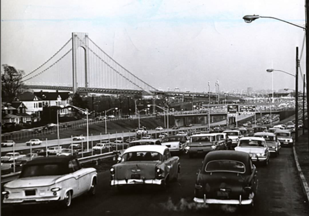 Traffic Enters The Verrazzano-Narrows Bridge On The Day After Opening, 1964.