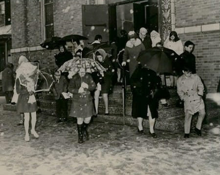Parishioners Of St. Roch Church Leaving Easter Service In Snow, Staten Island, March 29, 1970.