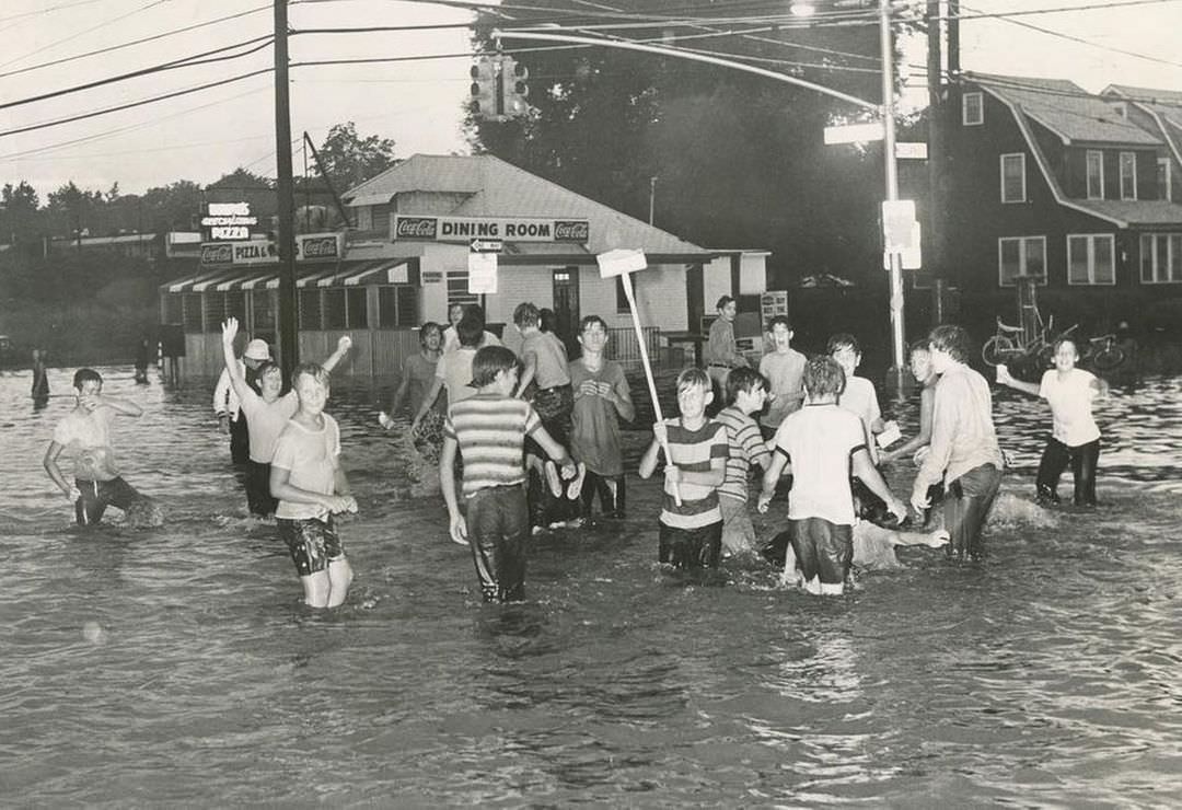Neighborhood Youngsters Swim At Midland Avenue And Hylan Boulevard After Flooding, 1971.