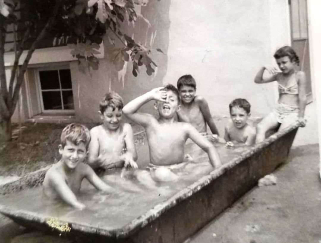 Cooling Off In A Makeshift Pool On Winham Avenue In New Dorp, Circa 1950S.
