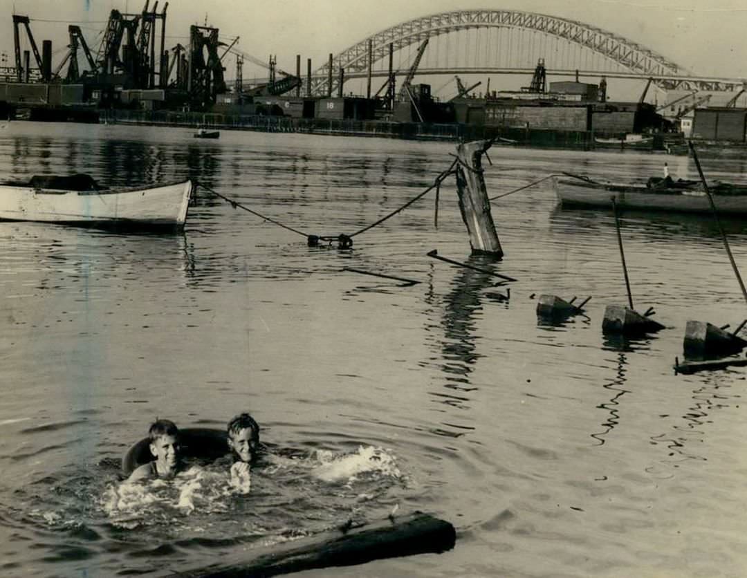 James Andrews And John Thompson Swimming In Kill Van Kull, Staten Island, 1933.
