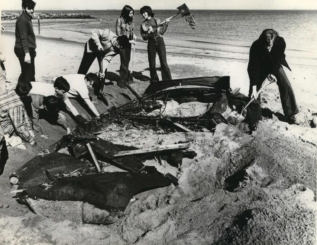 New Dorp High School Students Dig Out A Car Buried In The Sand, 1970.