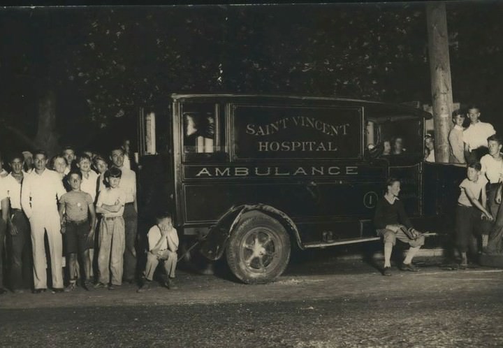 Crowd Views St. Vincent'S Hospital'S Ambulance On Bard Avenue, Circa 1935