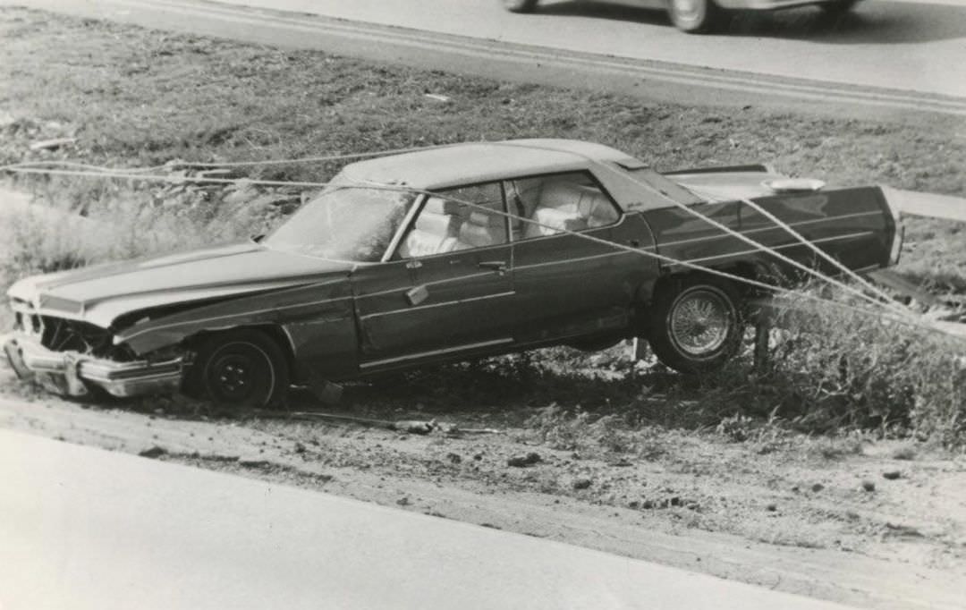 Car Caught In The Guard Rail-Wires On The Staten Island Expressway, 1984.