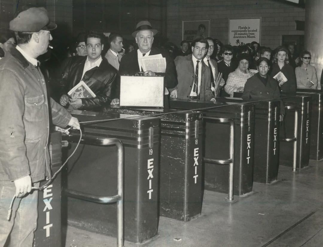 Rush Hour Commuters Wait At Turnstiles In The St. George Ferry Terminal, 1969.