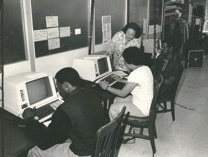 Wildcat Service Corporation Operators Demonstrate New Computer Terminals To Mrs. Amalia V. Betanzos, 1979.