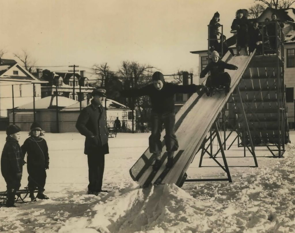 Children Play In The Snow On A Walker Park Slide; Park Holds A Distinguished Place In The History Of New York Cricket And Tennis, 1936