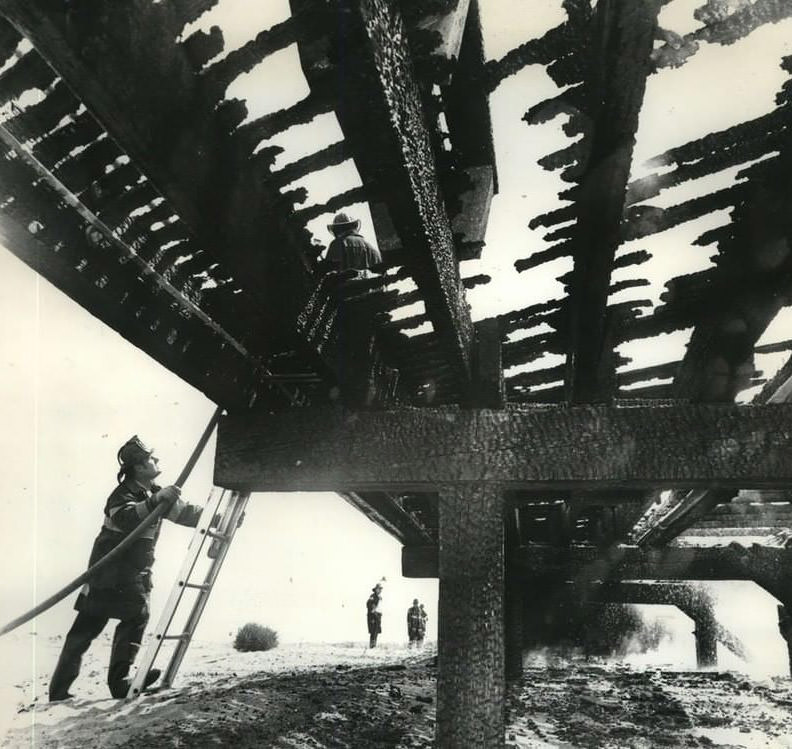 Fire Investigators Inspect Charred Timbers At South Beach Boardwalk, 1976.