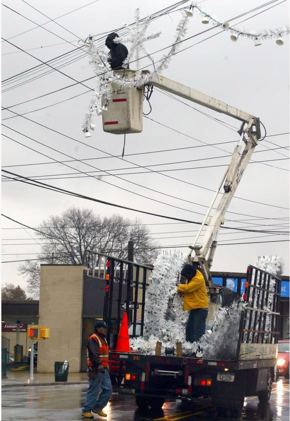 Workers Prepare Holiday Lights To Hang Along Forest Ave., 2004.