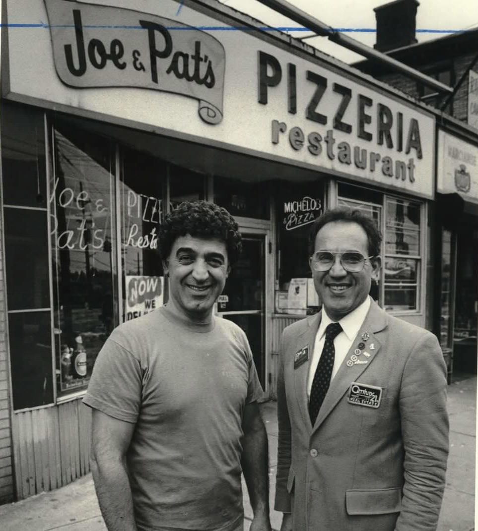 Joe And Pat Pappalardo Stand In Front Of The Iconic Castleton Corners Pizzeria Bearing Their Names, 1989.