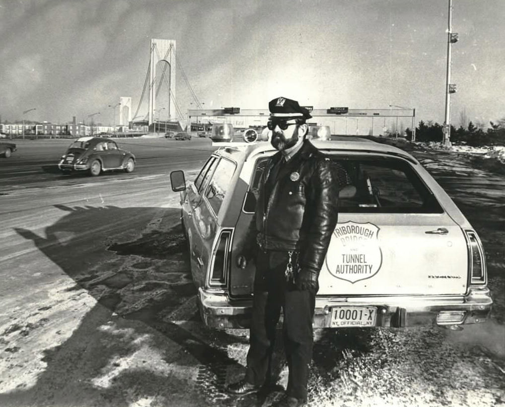 Lieutenant Daniel Hegarty Keeps An Eye For Traffic Violators At The Verrazano-Narrows Bridge Toll Plaza, 1977.