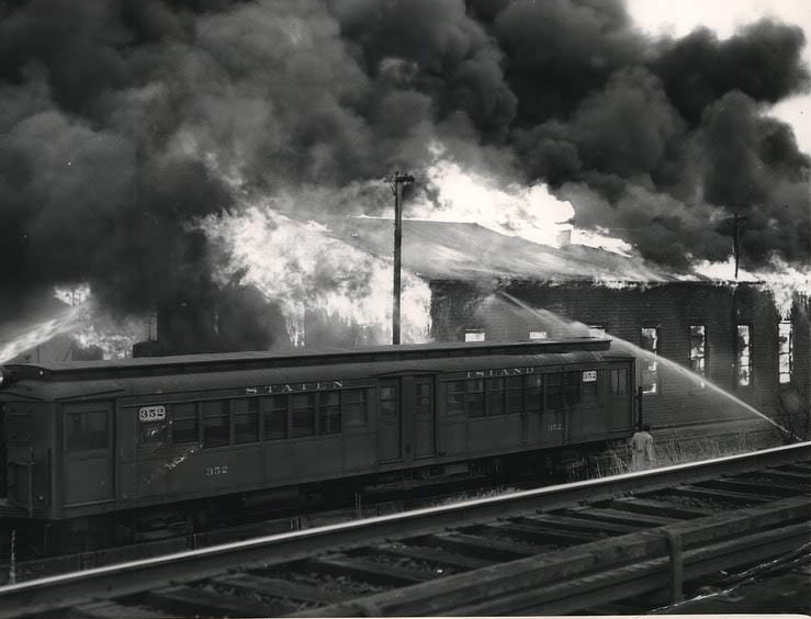 Smoke Pours From Flaming Electric Shop Of The Staten Island Rapid Transit Company During Four-Alarm Fire, 1962.