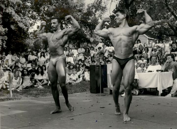 Guy Decatrel And Richard Seve Flex Muscles During A Bodybuilding Competition At The Richmond County Fair, 1990.