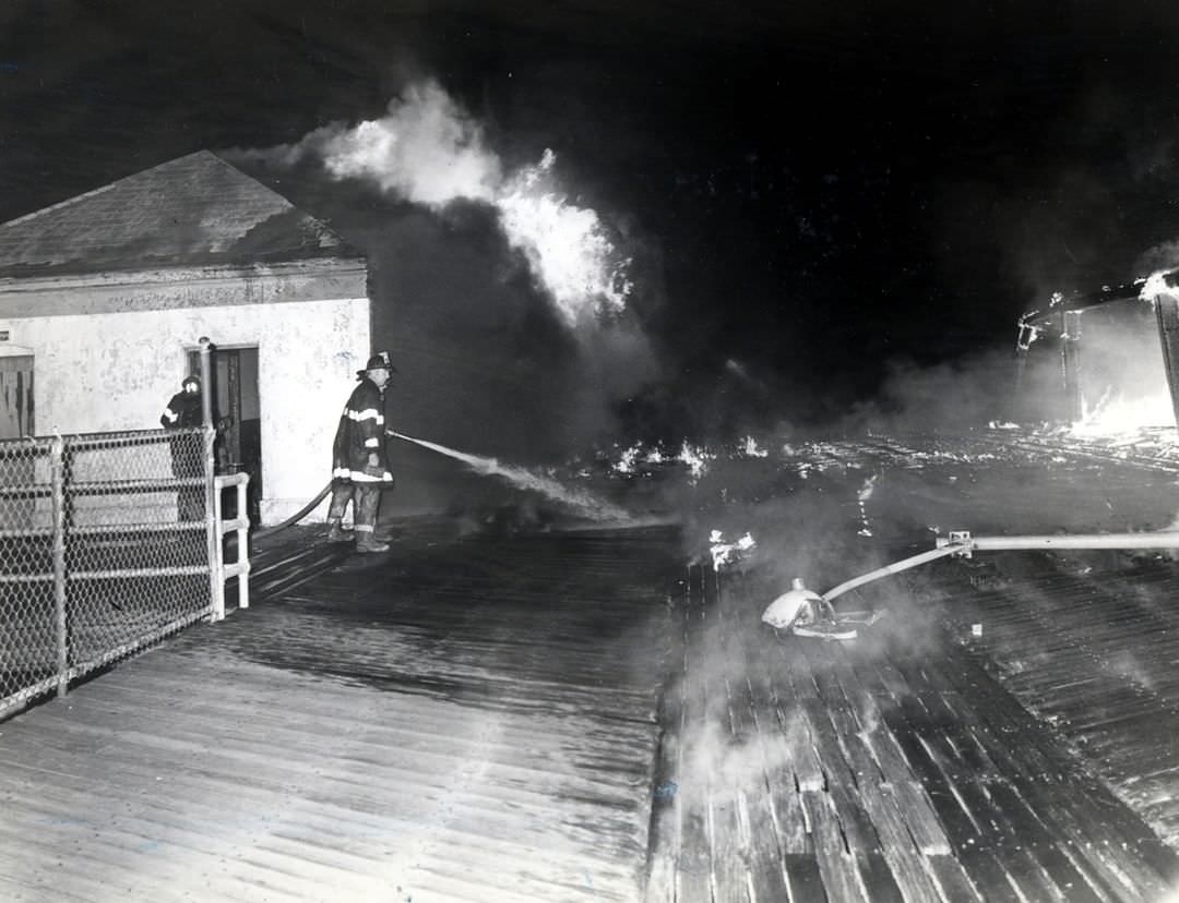 Fireman Douses Flames At The South Beach Boardwalk, Staten Island, 1978.