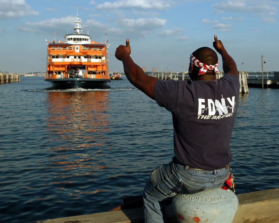 Terry Reed Of Port Richmond Hails The Arrival Of The Guy V. Molinari At The St. George Ferry Terminal, 2004.