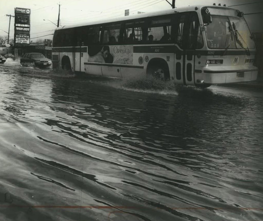 A Bus Navigates Through A Puddle On Hylan Boulevard And Rose Avenue In New Dorp, 1993.