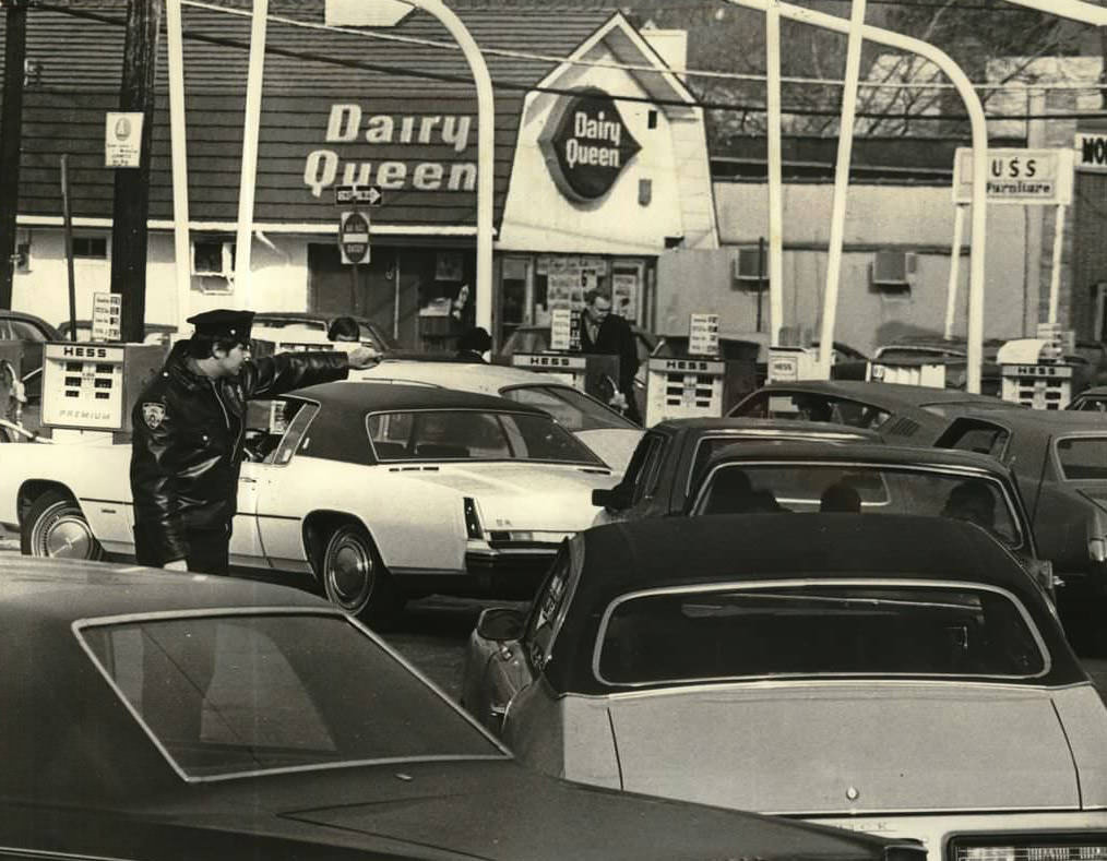 Police Officer Directs Cars On Staten Island During 1970S Gas Crisis, Former Dairy Queen In Background, 1970S.