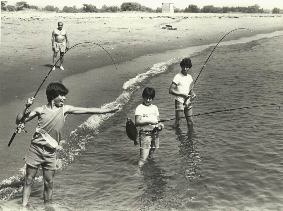 Anthony Contessa, John, And Vincent Adragna Fish Off A Staten Island Beach, 1980.